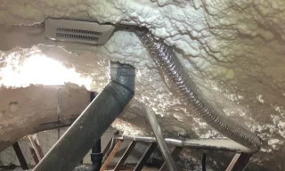 Which Attic Layer Grabs the Moisture From Your Shower?